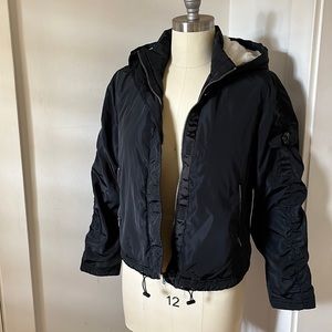 Lightweight Jacket with fake fur lined hood.
